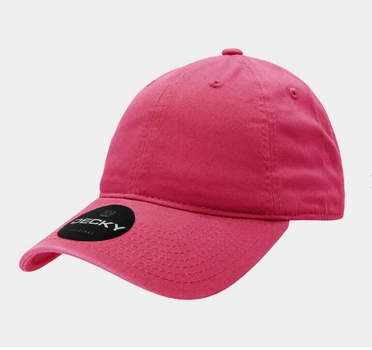 A pink six-panel low-profile dad hat made of soft fabric with a curved brim. The hat features a black 'Decky' brand sticker on the visor and has an unstructured, relaxed fit.