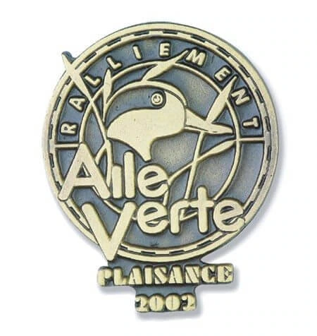 pewter pin with world logo