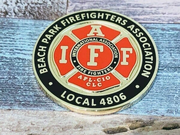 die struck custom silver coin for fire departments