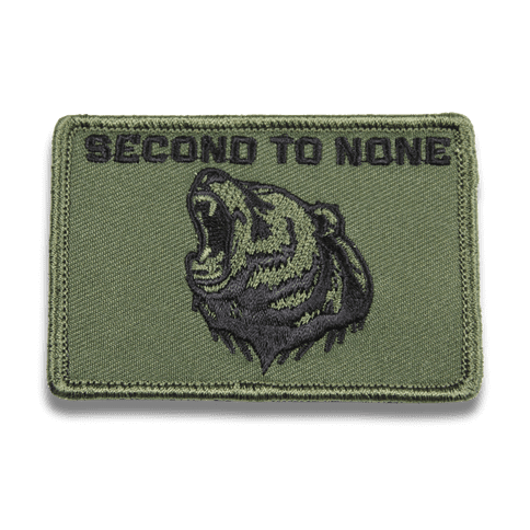 second to none custom patch with a dark green background