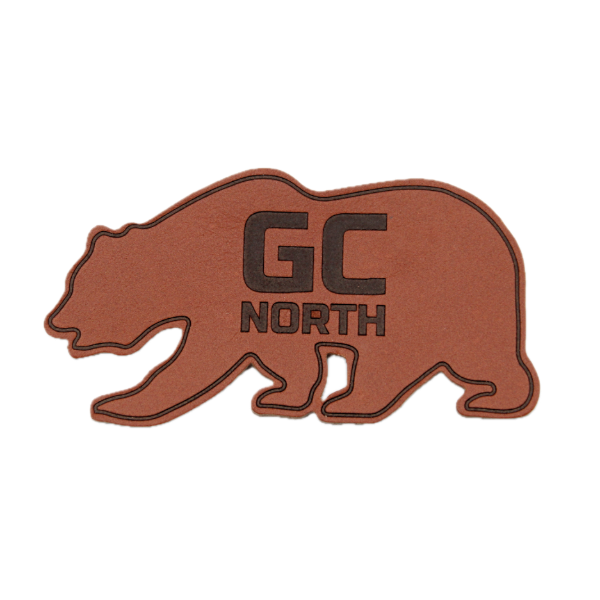 Custom leather bear patch that has a GC North Company logo on it.