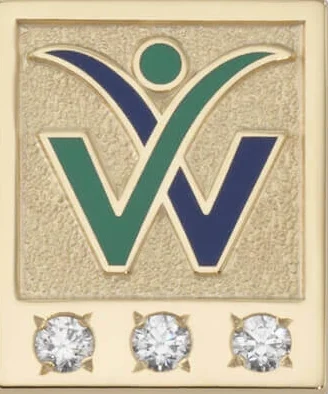 three diamonds on a gold pin