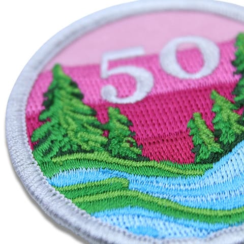 custom patch with the numer 50 on it and a pink background