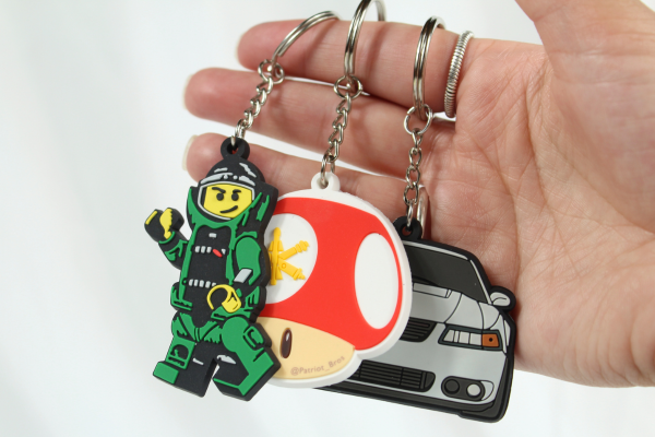 group of three PVC keychains