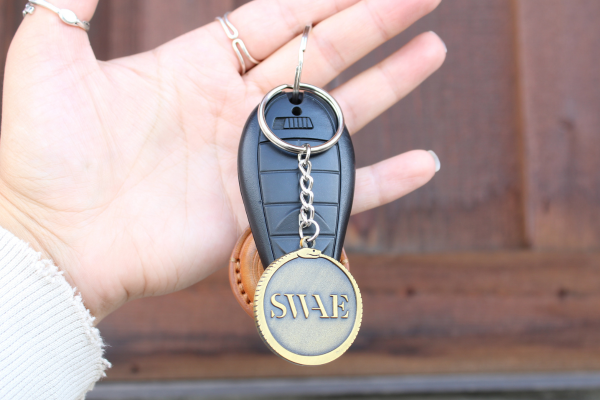 Die-struck keychains on keys